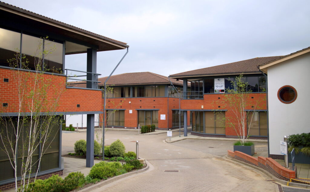 Large commercial building with gutters